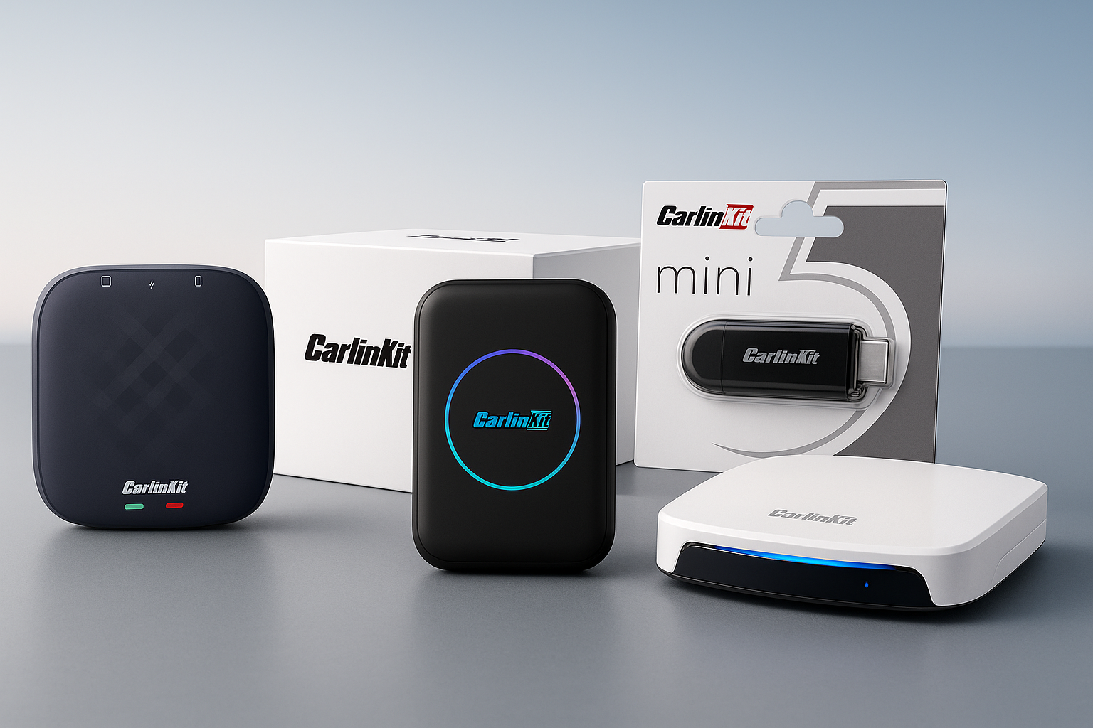 Collection of CarlinKit devices and packaging on a gray background